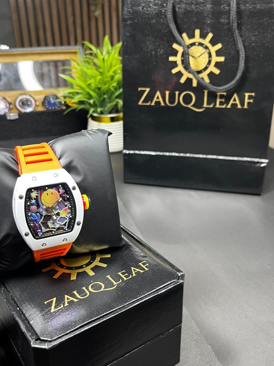 Zauq Leaf RM 88 Inspired White Case Orange Strap Smiley Men's Watch
